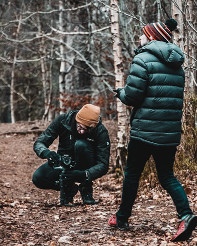 Me balancing a gimbal with Steve in the woods taken by Kenneth Millen